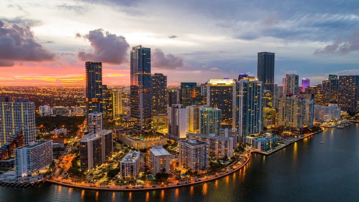 The Miami skyline seen from a boat on Biscayne Bay in late afternoon light